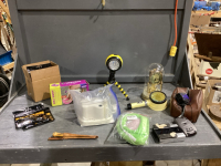 ANNIVERSARY CLOCK, LIGHT ON STAND, MAGNIFYING GLASS, FIRE STARTER, WATERPIK, FILLET KNIFE, MISC ELECTRONICS IN A GOOD LIDDED TOTE