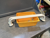 SHOWER SAFETY BARS AND ORANGE TUB