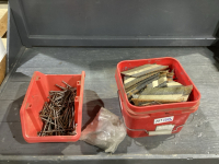 BIN + BUCKET OF COMMON NAILS, STRIP NAILS, A FEW HINGES