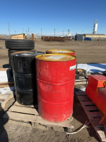Three steel 45 gallon barrels with lids