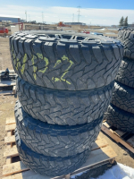 Set of four Toyota tires on aluminum rims