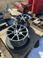 Set of two car tires with four Dodge rims