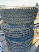 4 Light Truck Tires on rims