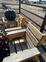 Two wooden yard chairs