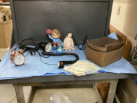 (2) LAMPS, ALARM CLOCK, MATERIAL REMNANTS, VINTAGE DOLLS, WALL HOOK, (3) CUBBY BASKETS