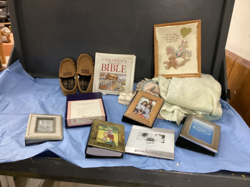 BOX W/ BABY BLANKETS, FRAMES, BIBLES, MOCCASIN SLIPPERS