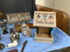 (2) BOXES MISC DECOR - "PEOPLE" SNACK FEEDER, PLUG-IN SCENTSY, FRAMES, RESIN COWBOY & CALF ORNAMENT - 2