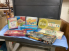 BOX OF GAMES - CRANIUM,SCRABBLE, PICTIONARY, TROUBLER, TABOO, BATTLESHIP ETC