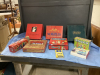 BOX OF BOARD GAMES - SCATTERGORIES, TRIVIAL PURSUIT, QUELF, RACKO, RODEO RAMA, UNO STACKO