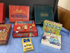 BOX OF BOARD GAMES - SCATTERGORIES, TRIVIAL PURSUIT, QUELF, RACKO, RODEO RAMA, UNO STACKO - 3