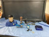 BOX OF MISC COLLECTIBLES - SPOCK COOKIE JAR, METAL DRAGON, DIE CAST MOTORCYCLE, MAXAM JACK KNIFE