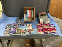 (2) BOXES W/ CD'S, ROMANCE BOOKS, WOOD CLOTHES PINS