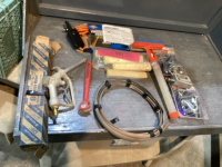 LIGHTER CHARGE CABLES, NEW ROTARY OF MOWER BLADES, PUMP NOZZLE, SQUEEGEE, ETC