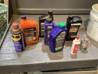 WD40, PART JUGS OF OILS, CHAIN OIL, PVC CEMENT GLUE,