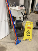 (2) MOP HANDLES, BUCKET WITH WRINGER, "WET FLOOR" SIGN AND BRUSH