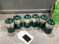 6 COLEMAN PROPANE BOTTLES, BOTTLE GAUGE W/TOTE & LID