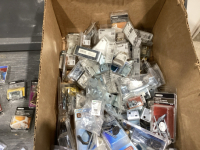 BOX OF ASSORTED SWAG LOCKS, PICTURE HANGERS, HINGES, SAFETY LATCHES, DOOR PULLS
