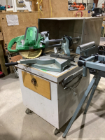 HITACHI COMPOUND SLIDING MITRE SAW - 10"... W/ ROLLING CABINET
