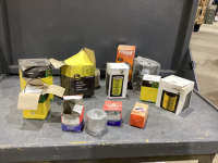 ASSORTMENT OF FILTERS, AND A COUPLE OF PISTONS