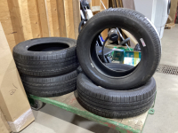 NEW (4) MICHELIN DEFENDER TIRES - 245/60 R18. 105H