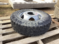 (1) GOODYEAR WRANGLER TIRE ON DUALLY RIM. - LT 235/80 R17