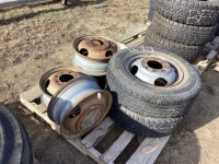 PALLET W/ (4) STEEL RIMS AND (2) TIRES ON MATCHING RIMS