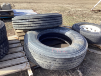 (2) MISMATCHED TIRES - DUNLOP AND LONGMARCH. ....