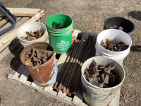 PALLET W/ (6) BUCKETS OF CONCRETE FORM BRACKETS/FASTENERS AND METAL STAKES