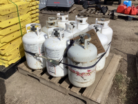 (8) FULL AND (1) IS 1/2 FULL PROPANE TANKS
