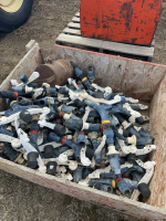 Crate of sprinkler heads and parts