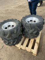 Set of four RV tires on rims