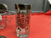 SILVER RIMMED GLASSES W/ COASTERS. ON CADDY - 2