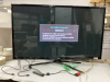 SAMSUNG 60" FLAT SCREEN TV W/ REMOTE ON STAND