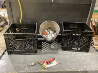 2 CRATES AND A PAIL OF GOLF BALLS
