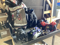 WHEELED EASTON BAG W/ YOUTH HOCKEY PANTS, SHOULDER PADS, ELBOW PADS, HELMET W/ CAGE, NECK GUARD