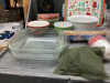 TOTE W/ MISC HOUSEHOLD ITEMS - ACRYLIC CUPS, BOWLS, (2) SQUARE CAKE PANS, (4) SMALL CORELLE PLATES, BLUE GLASSES ETC - 4