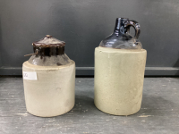(2) POTTERY CONTAINERS - WHISKEY JUG & JAR W/ LID