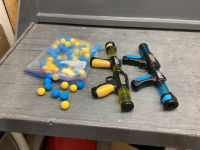 (2) ATOMIC POWER POPPER GUNS W/ BAGFUL OF BALLS