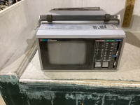 IN SINK ERATOR + SMALL EMERSON 5 IN COLOR TV