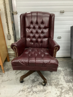 DEEP BURGUNDY LEATHER ROLLING OFFICE CHAIR - SWIVELS AND CAN ROCK