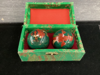 VINTAGE STRESS BALLS THAT CHIME WHEN HANDLED.... IN ORIGINAL BOX