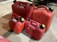(4) PLASTIC RED JERRY CANS