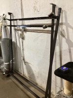 (2) METAL BED FRAMES ON CASOTRS