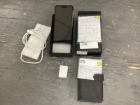 I15 PROMAX CELL PHONE W/ CASE AND CHARGER