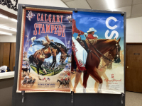 (2) STAMPEDE POSTERS - 1999 AND 2023