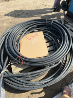 Two rolls of 1 and 1/4 inch plastic waterline