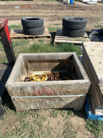 Wooden box with heavy chain, sling, and hooks