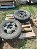 Two mismatched tires on rims