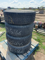 Stack of ( 4 ) 16 inch truck tires on eight bolt aluminum rims