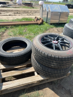 Three tires, two on rims